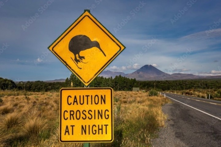 a sign on the side of a road