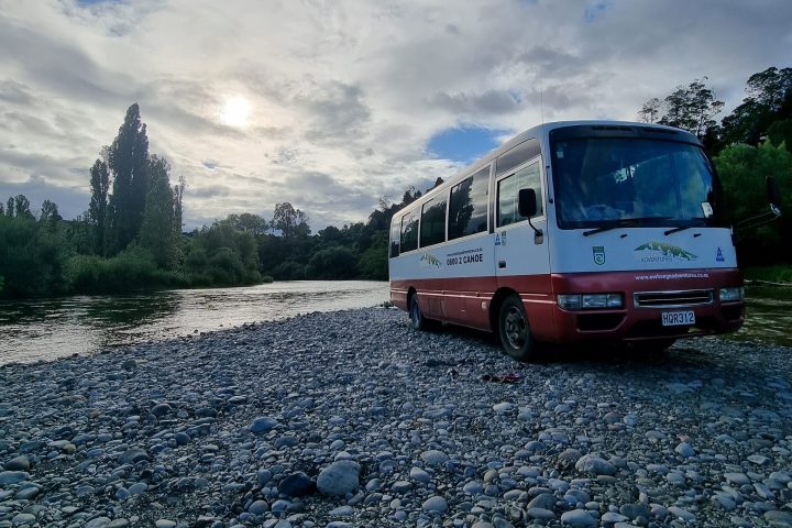 a train traveling down a dirt road